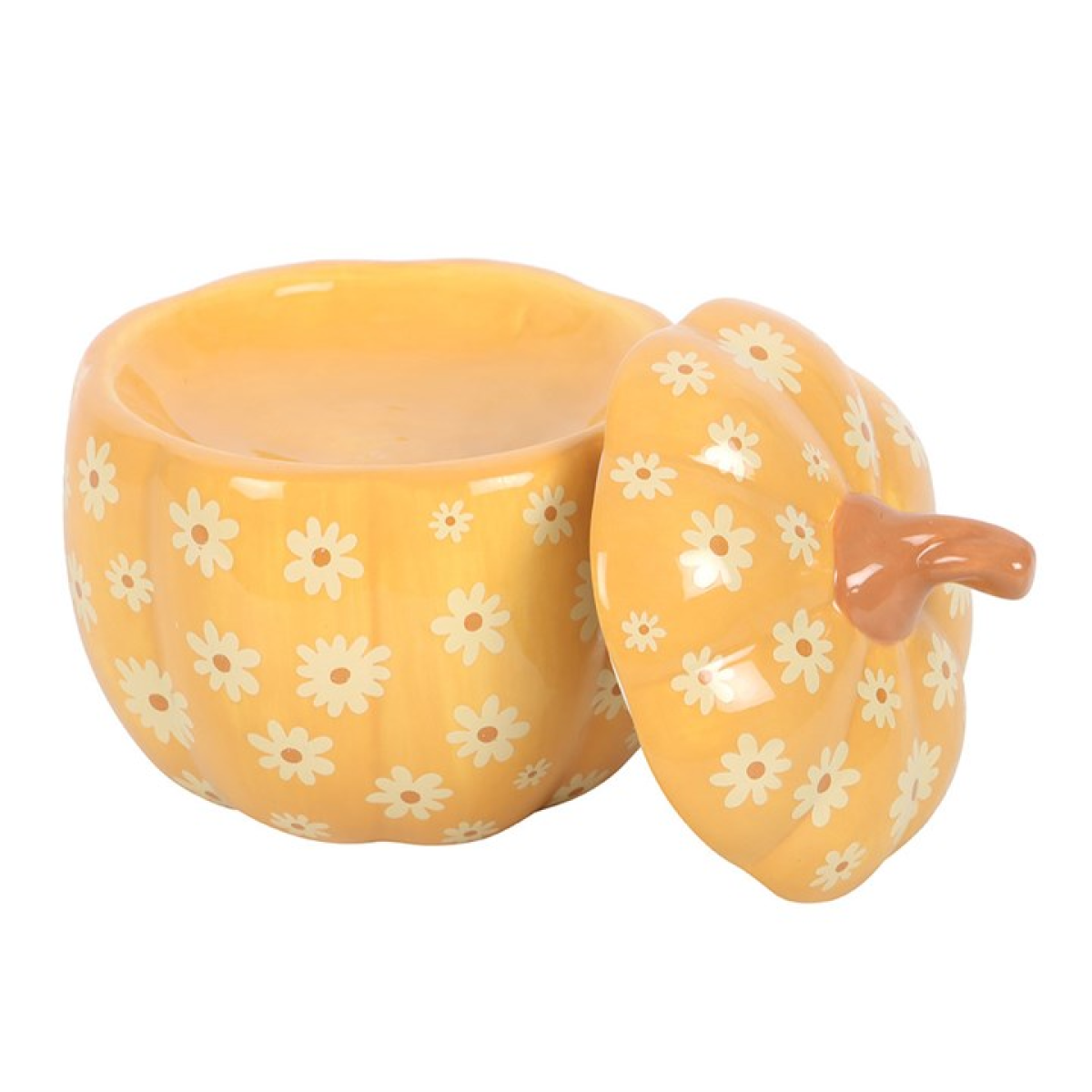 Ceramic pumpkin shaped wax melter and oil burner, decorated with an all-over daisy print.