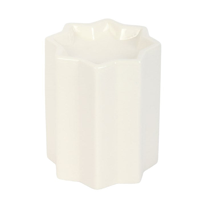 White ceramic oil burner, shaped like an eight-point star.