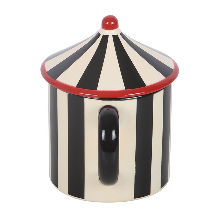 Monochrome striped circus tent-shaped ceramic mug with a pointed lid. Side view.