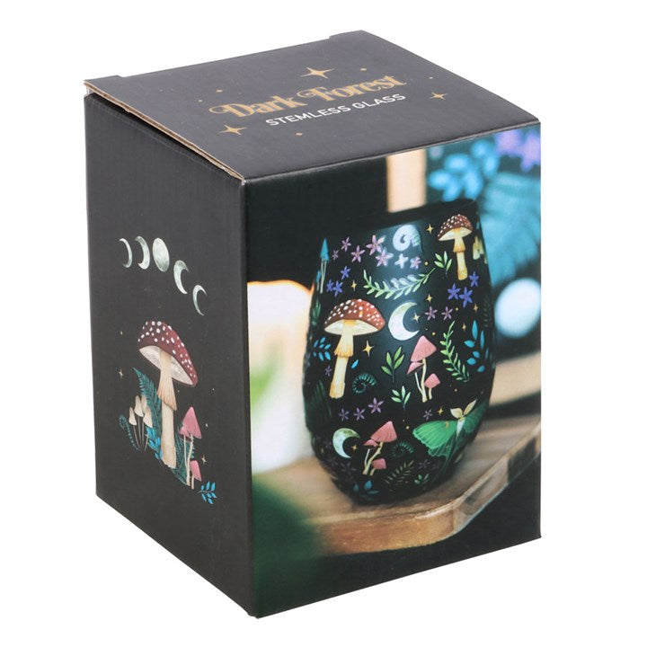 Black stemless wine glass decorated with a mushroom, fauna and luna moth motif, presented in a themed box.