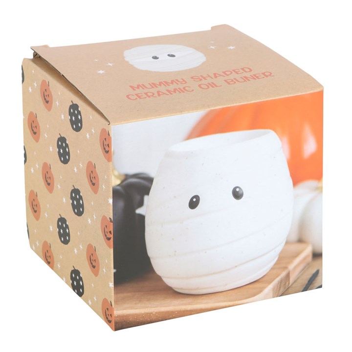 Mummy shaped ceramic wax melter and oil burner. Presented in a themed box.