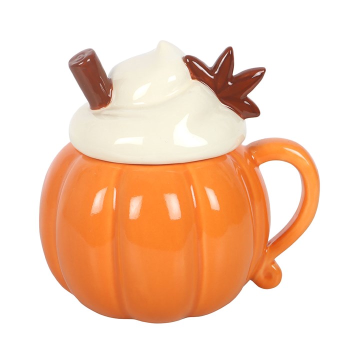 Ceramic wax melter and oil burner shaped like a pumpkin-shaped mug with a whipped cream and cinnamon shaped lid.
