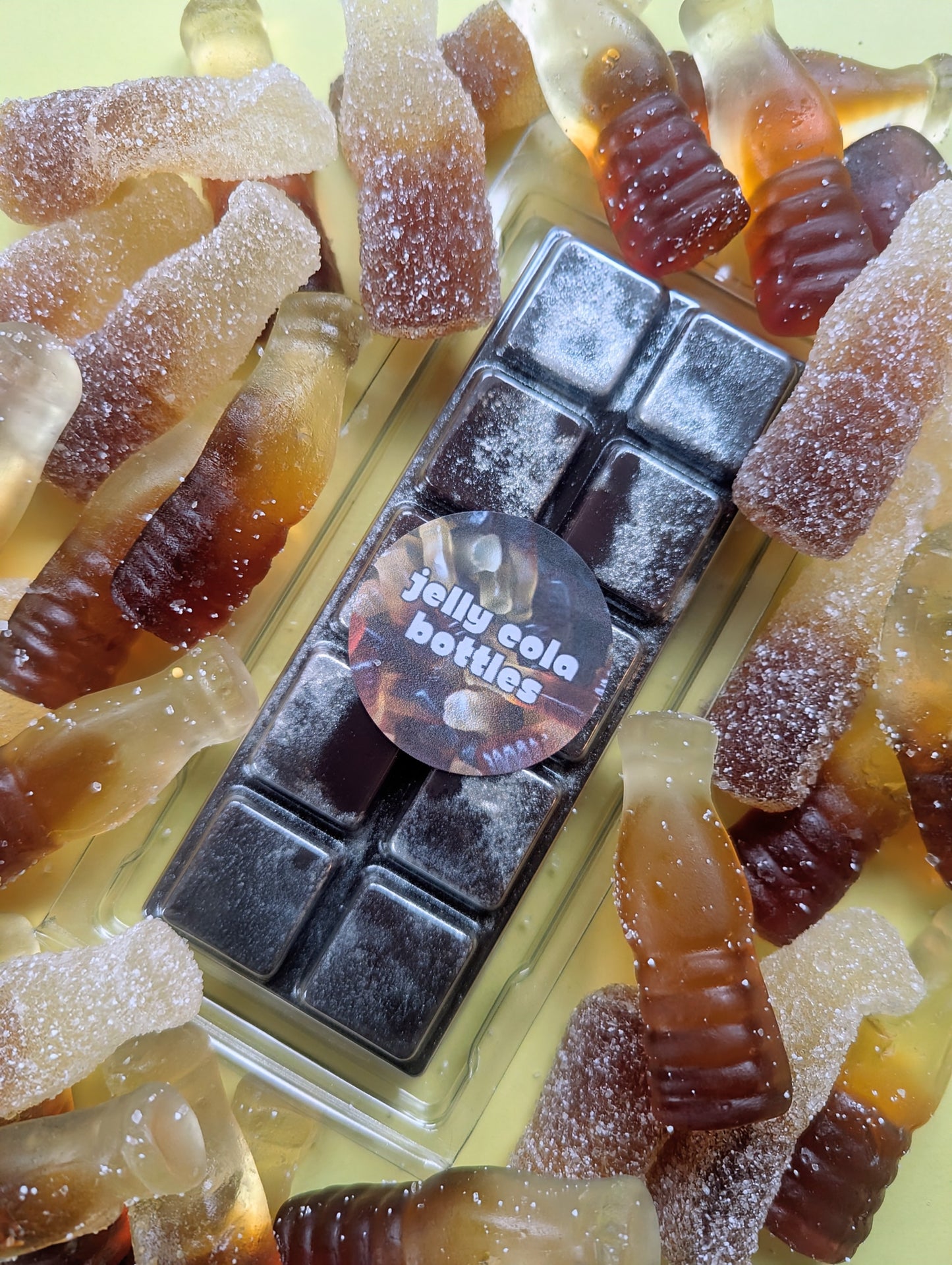 Jelly Cola Bottles coconut wax melt. Dark brown snap bar with silver shimmer accent.