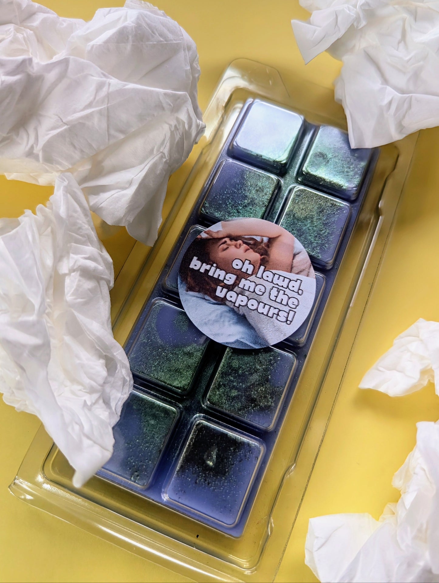 Oh Lawd, Bring Me The Vapours coconut wax melt. Deep blue snap bar with emerald green shimmer accents.