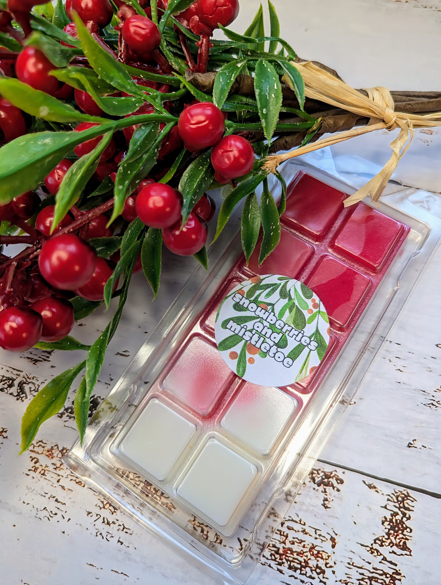 Snowberries and Mistletoe coconut wax melt. White and red ombre snap bar with shimmer accents.