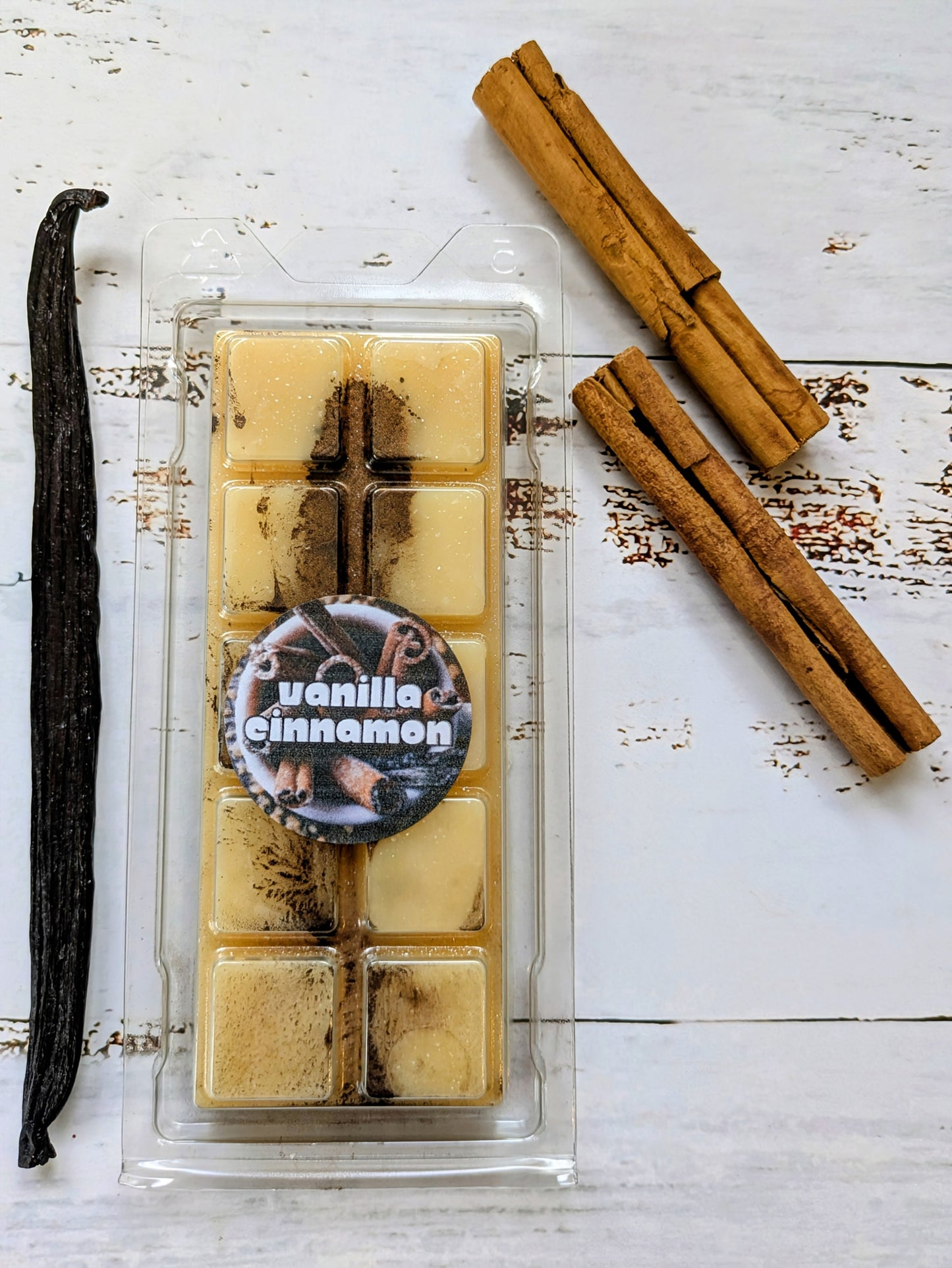 Vanilla Cinnamon coconut wax melt. Cream snap bar with bronze and brown shimmer accents.