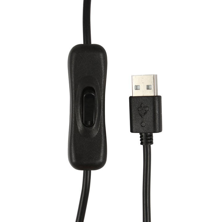 Electric wax melter and oil burner with a tarotcore palm reading design. Close up of USB plug and on switch.