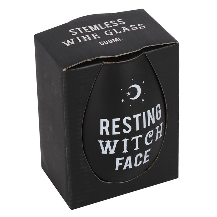 Black stemless wine glass with stars and moon motif and Resting Witch Face text. Presented in a box.