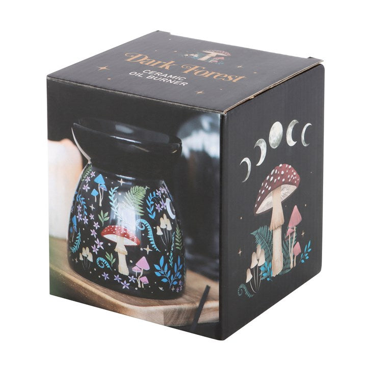 Black gloss ceramic wax melter and oil burner with dark forest inspired flora and fauna print. Presented in themed box.
