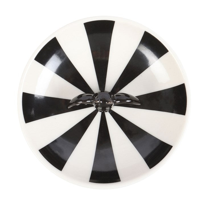 Black and white striped trinket dish, with a 3D bat in the center.