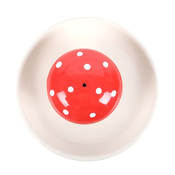 Fly agaric toadstool incense stick holder.
