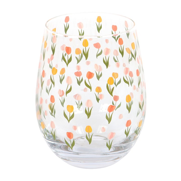 Clear rounded water glass covered in a tulip motif.