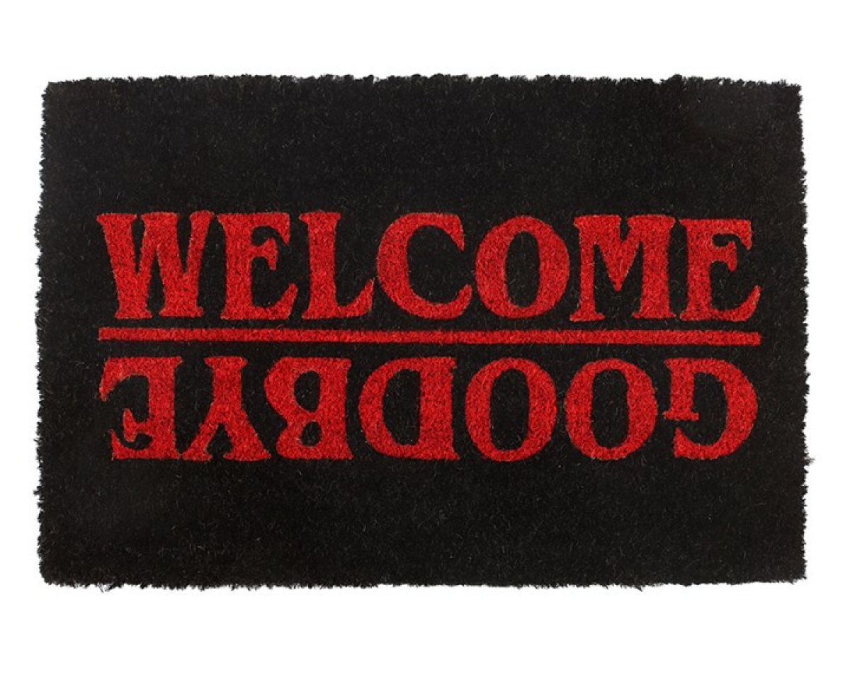Black natural-fibre door mat, designed with striking red Welcome / Goodbye text on a jet black background. Stranger Things-inspired design. 