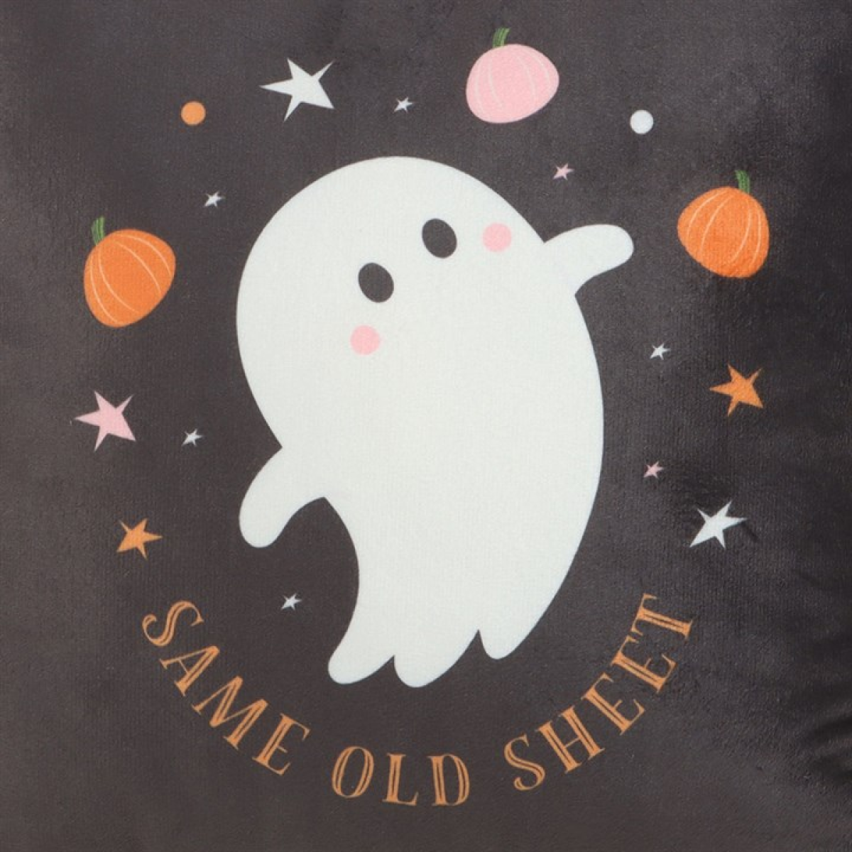 Black square throw cushion with tongue in cheek 'Same Old Sheet' text and adorable ghost motif. Close up on design.