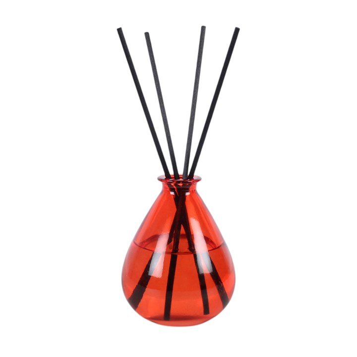 Blood Orange reed diffuser, presented in a deep orange teardrop bottle with black reeds. 