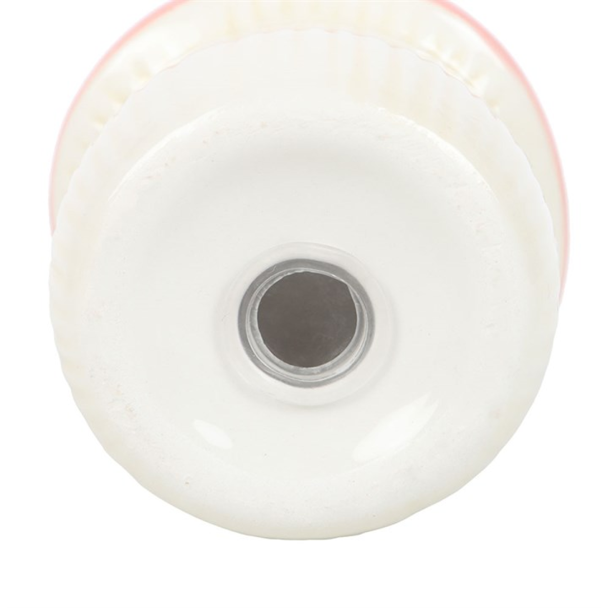 Close up of stopper on bottom of pink ceramic mushroom shaped salt shaker