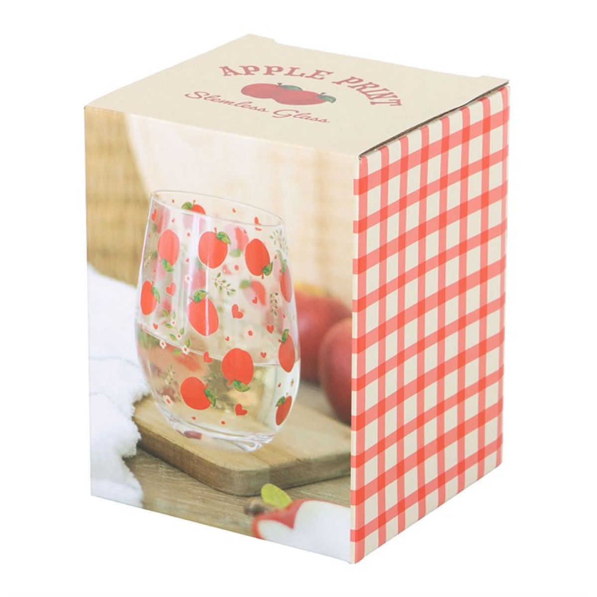Clear rounded water glass covered in a red apple motif presented in a white and red gingham box. 