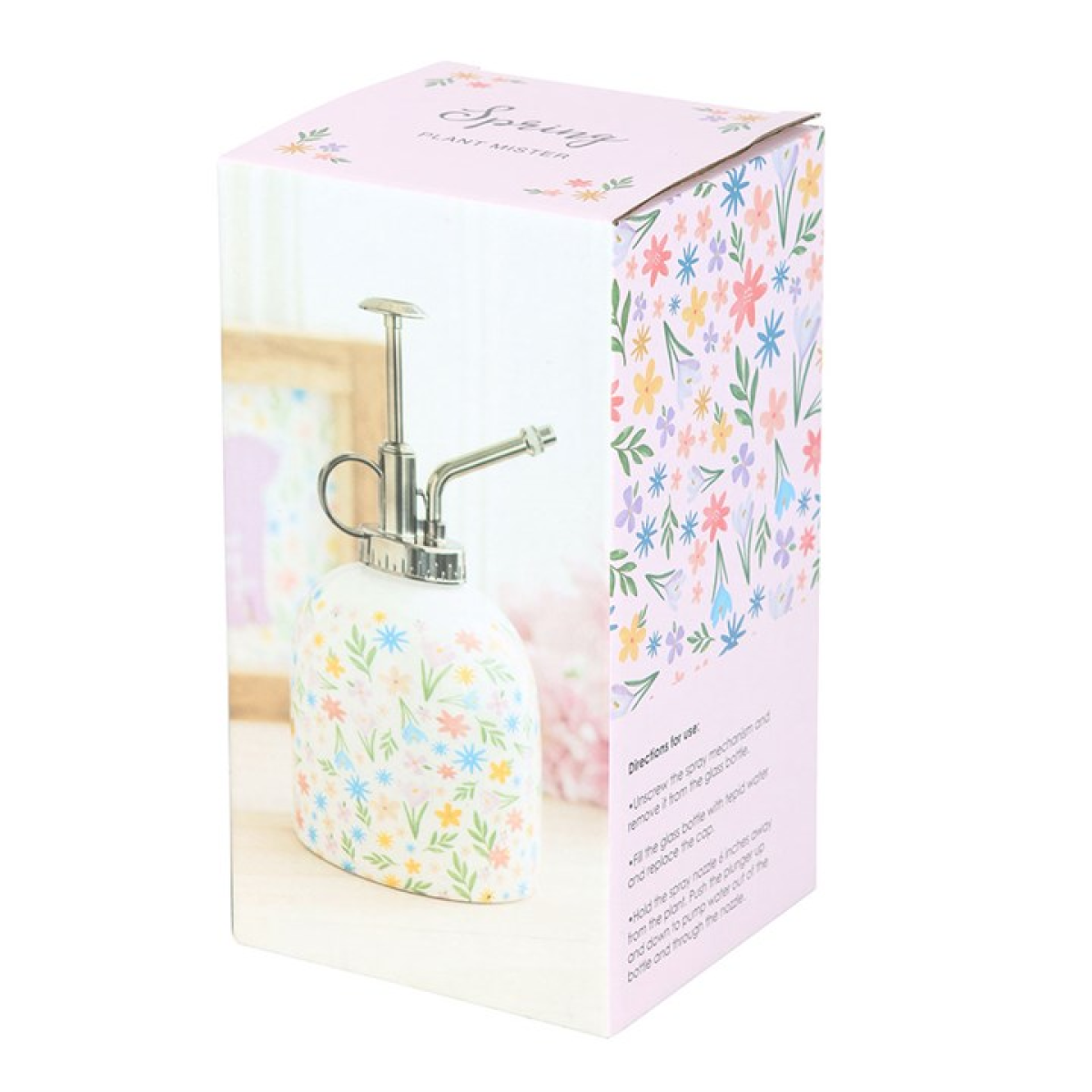 Ceramic plant mister finished with a pastel-hued spring florals motif and a silver effect spray pump. Presented in a themed box.