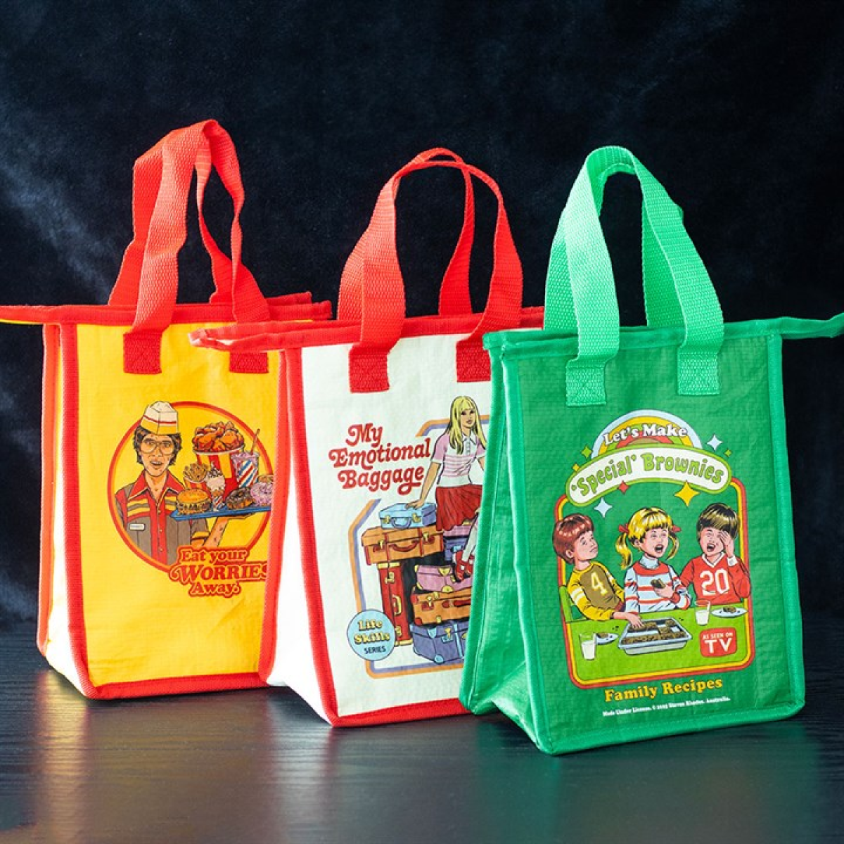 Let's Make Special Brownies reusable lunch bag. Sustainably made from recycled plastic. Presented alongside other items from the same range. 