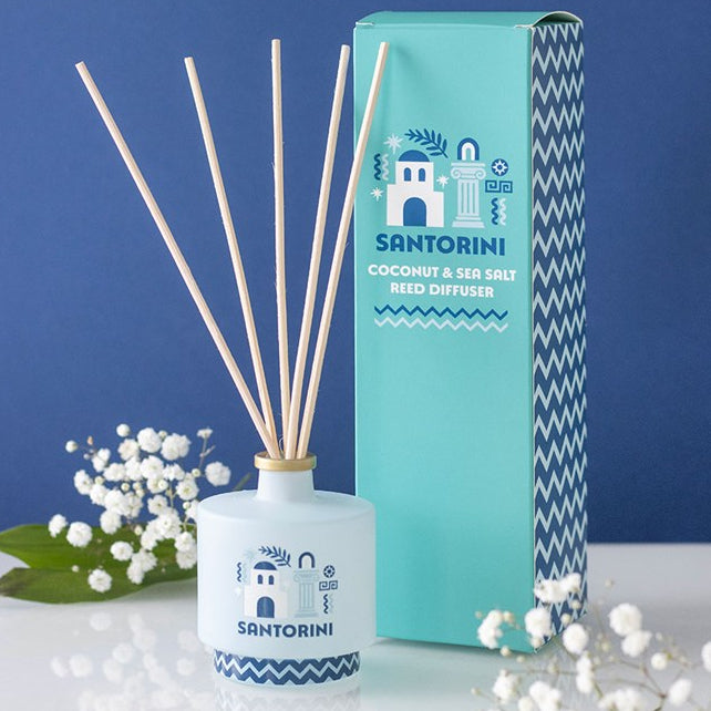 Santorini reed diffuser. Light blue glass bottle with greek architecture-inspired design. Reeds included. 
