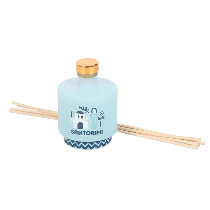 Santorini reed diffuser. Light blue glass bottle with greek architecture-inspired design. Reeds included. 