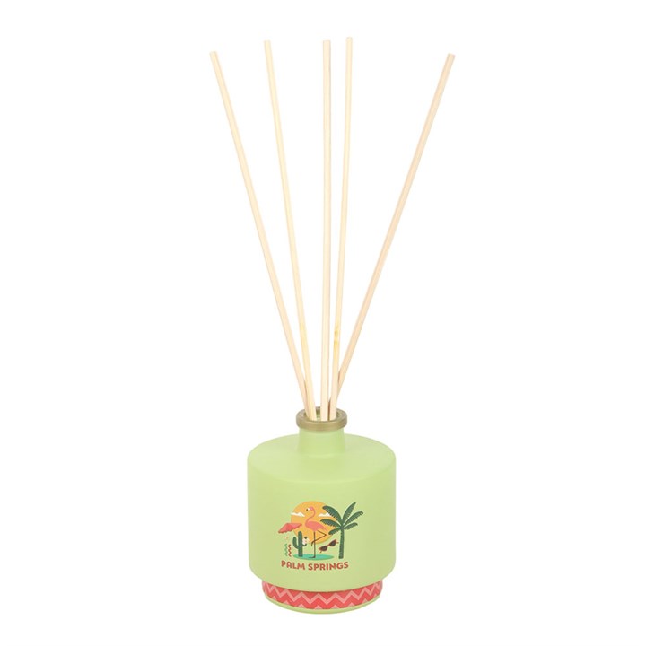 Palm Springs reed diffuser. Lime green bottle with palm tree and flamingo design. 