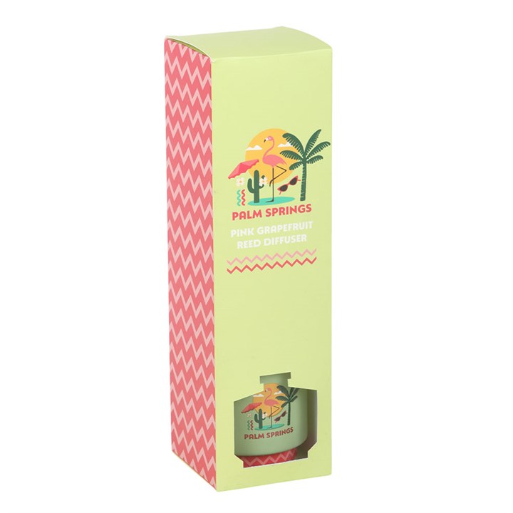 Palm Springs reed diffuser. Lime green bottle with palm tree and flamingo design. 