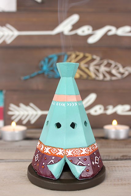 Boho-style teepee shaped incense cone burner.