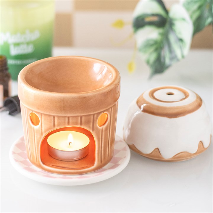 Cinnamon roll shaped ceramic wax melter and oil burner.