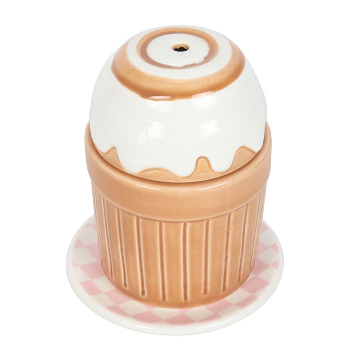 Cinnamon roll shaped ceramic wax melter and oil burner.