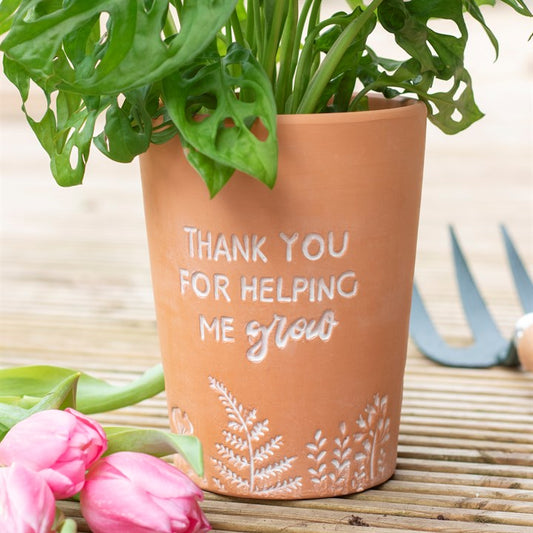 Terracotta plant pot with charming Thank You For Helping Me Grow text and fauna detailing.