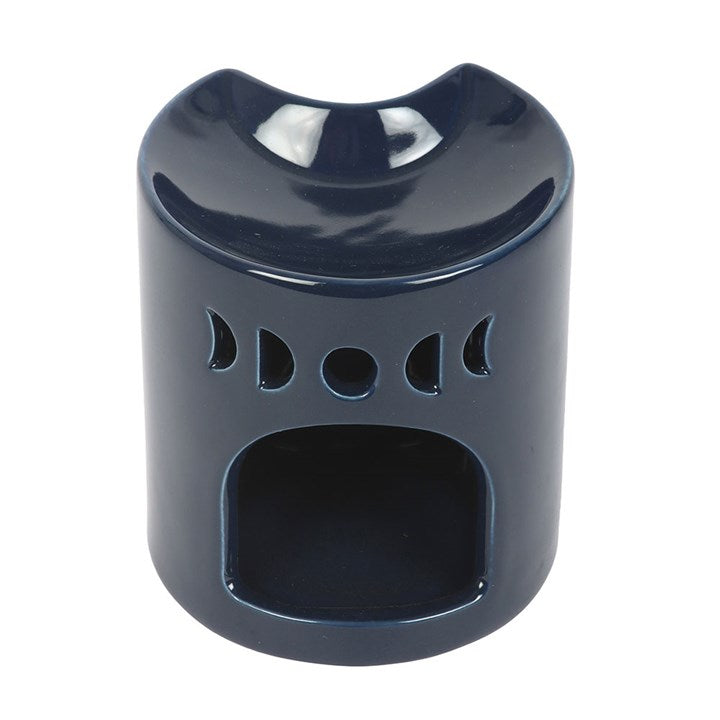 Blue ceramic crescent moon shaped oil burner.
