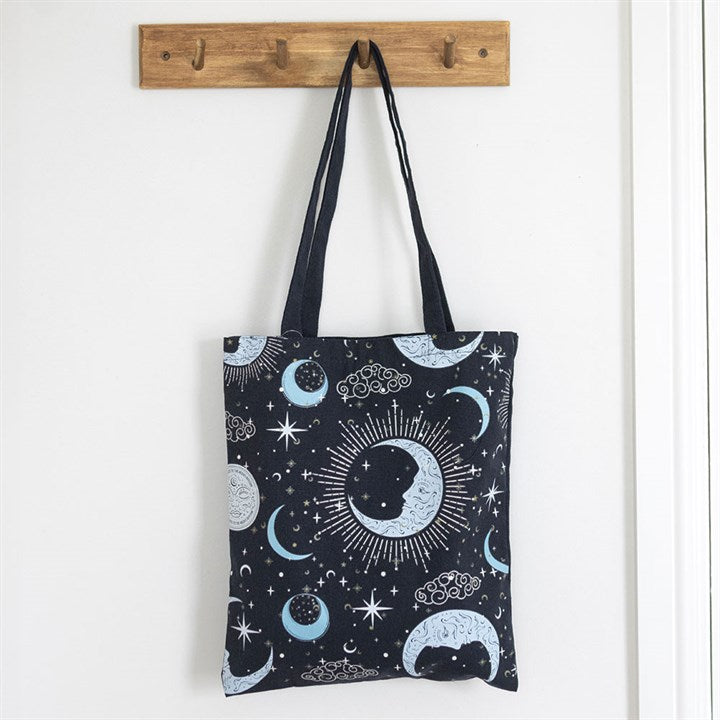 Navy polycotton tote bag with celestial night sky print. 