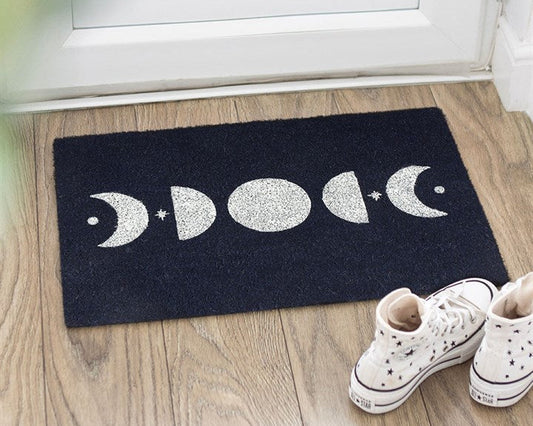 Dark blue decorative door mat with a simplified phases-of-the-moon design.