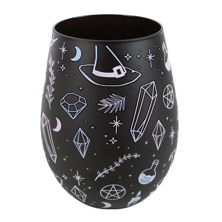 Black stemless wine glass decorated with a crystal, potion, witches hat motif.