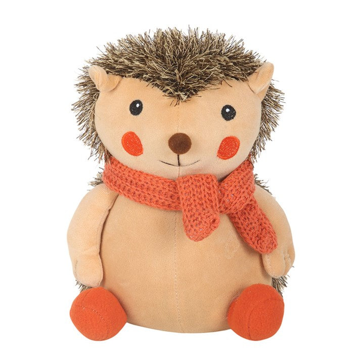 Woodland-themed weighted doorstop, shaped like a hedgehog with knitted orange scarf. 