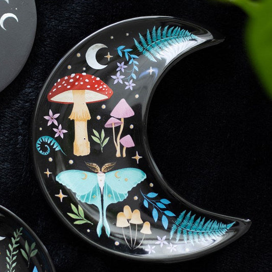 Crescent moon shaped trinket dish. Dark forest design including toadstools, luna moths and fauna on a black background. 