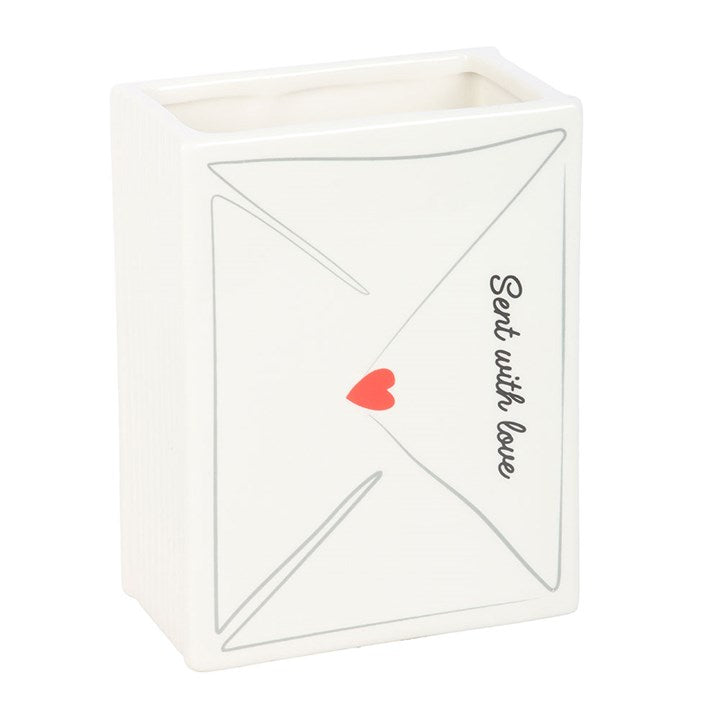 Ceramic flower vase shaped like a love note, complete with heart stamp and 'Sent With Love' text.