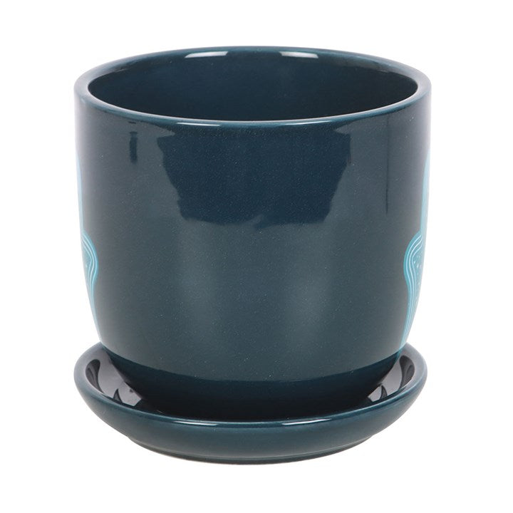 Dark blue ceramic plant pot with matching sauce and detailed Hand of Hamsa design. Reverse view.