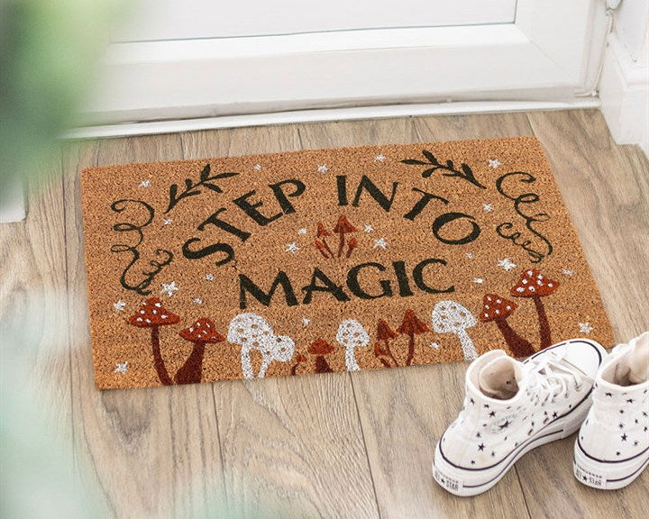 Decorative natural doormat with charming toadstool design and 'Step Into Magic' text.