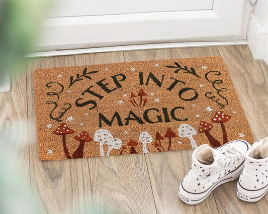 Decorative natural doormat with charming toadstool design and 'Step Into Magic' text.