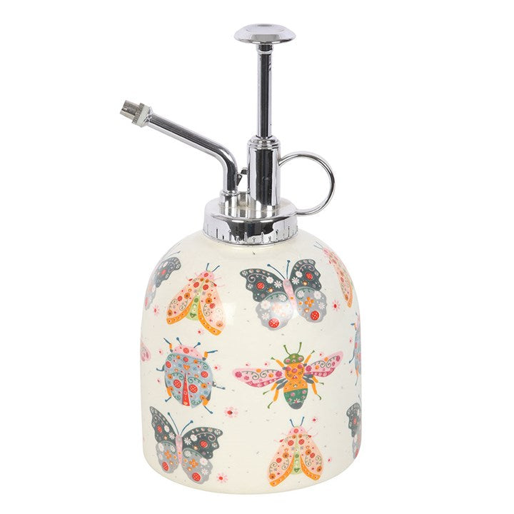 Ceramic plant mister with a bug-illustration motif and silver-effect spray pump.
