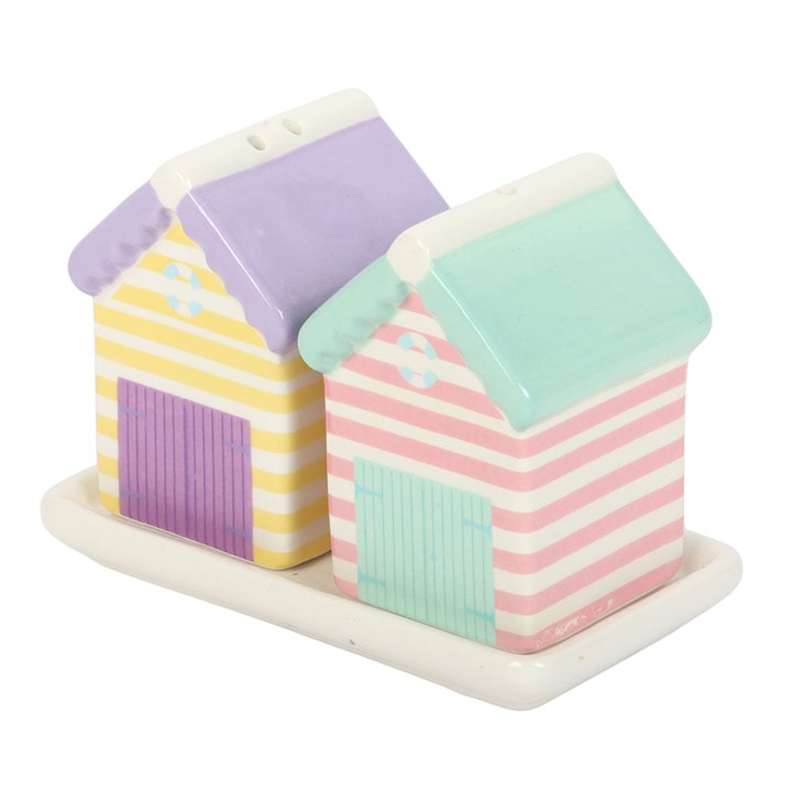 ceramic pastel striped beach-hut shaped salt and pepper shaker set on a matching storage tray. 