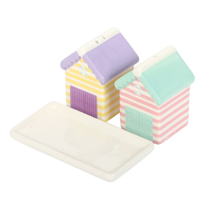 ceramic pastel striped beach-hut shaped salt and pepper shaker set on a matching storage tray. 