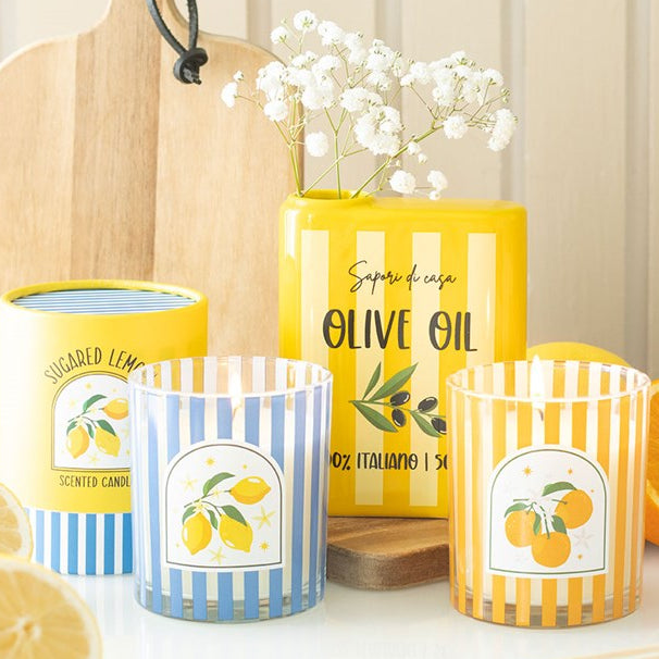 Flower vase shaped like a classic spanish olive oil can. Presented alongside other items from the same range.