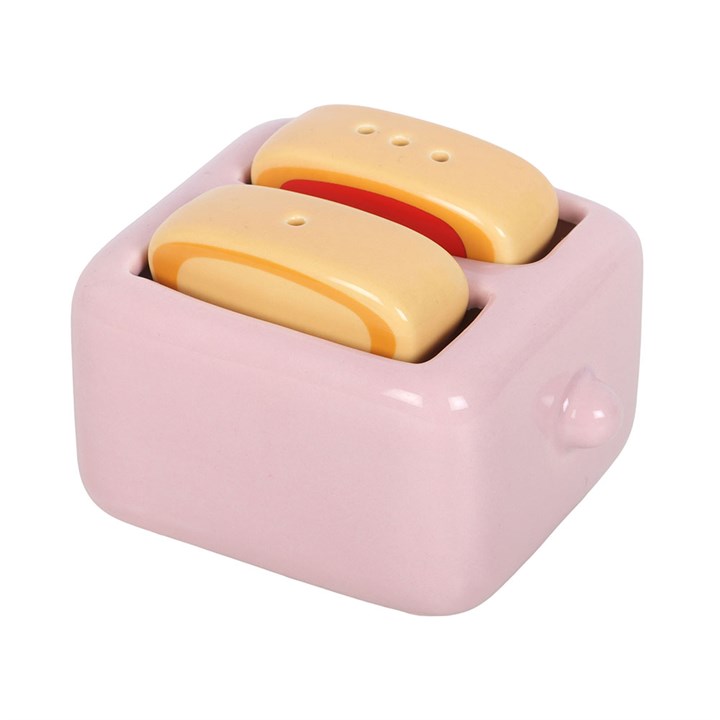 Two kawaii style toast salt and pepper shakers with peanut butter and jam detailing, sold with complementary pink toaster-shaped holder. 