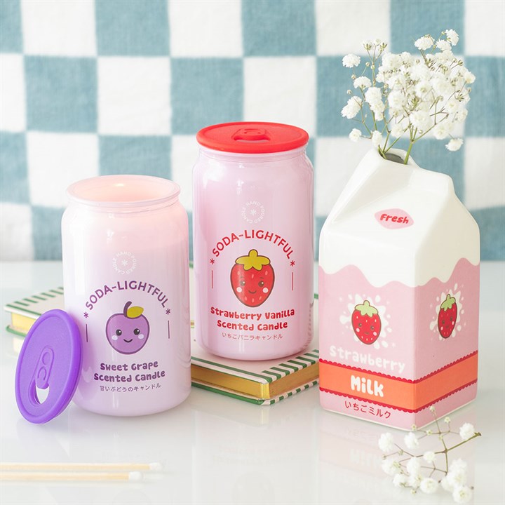 Kawaii style strawberry milk carton shaped flower vase. Presented alongside other items from the same range.