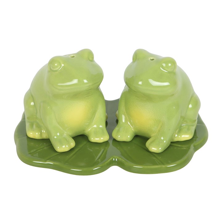 Frog shaped ceramic salt and pepper set on a lily pad tray. 