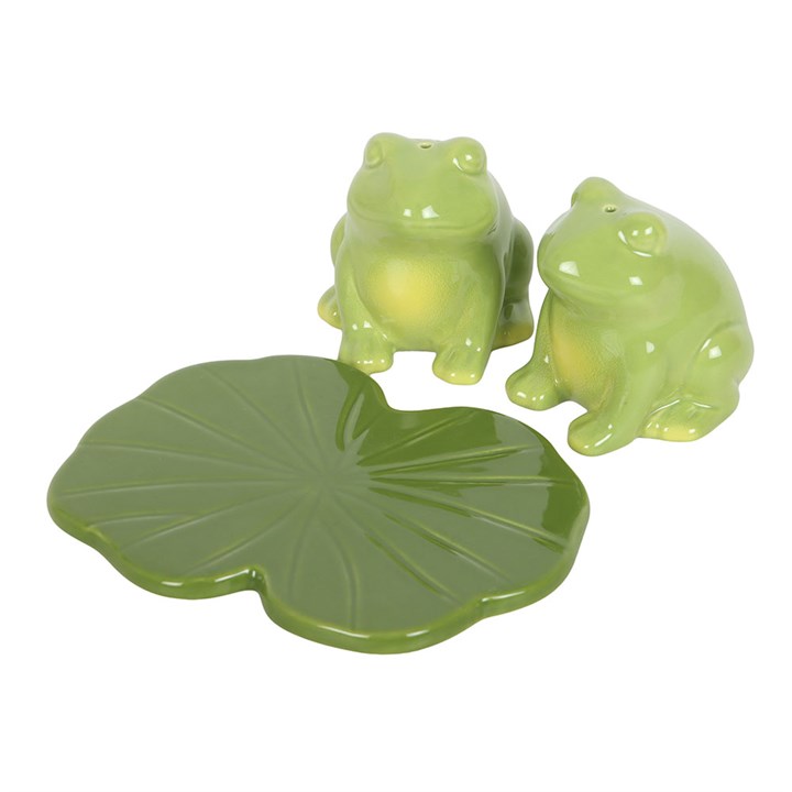 Frog shaped ceramic salt and pepper set on a lily pad tray. 