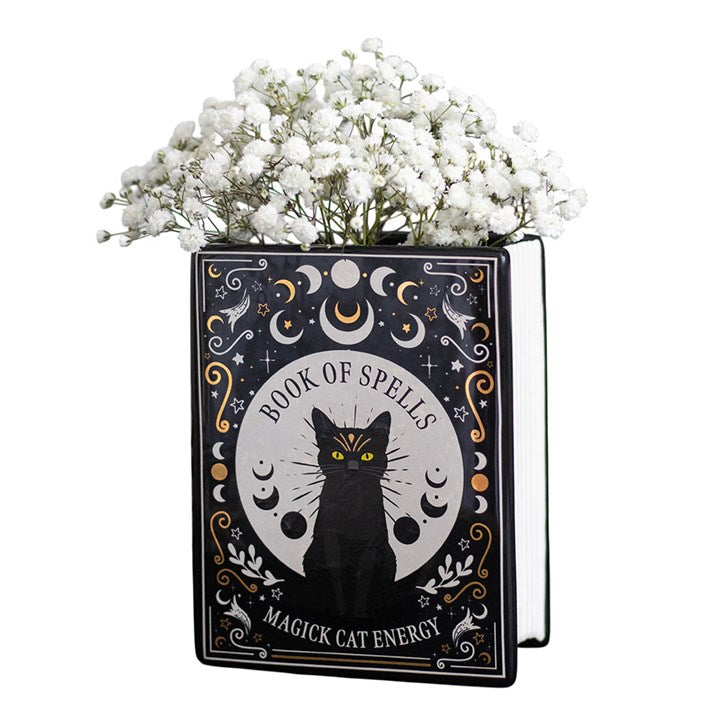 Black book shaped vase with gothic-inspired black cat celestial design and 'Book of Spells I Magick Cat Energy' text.